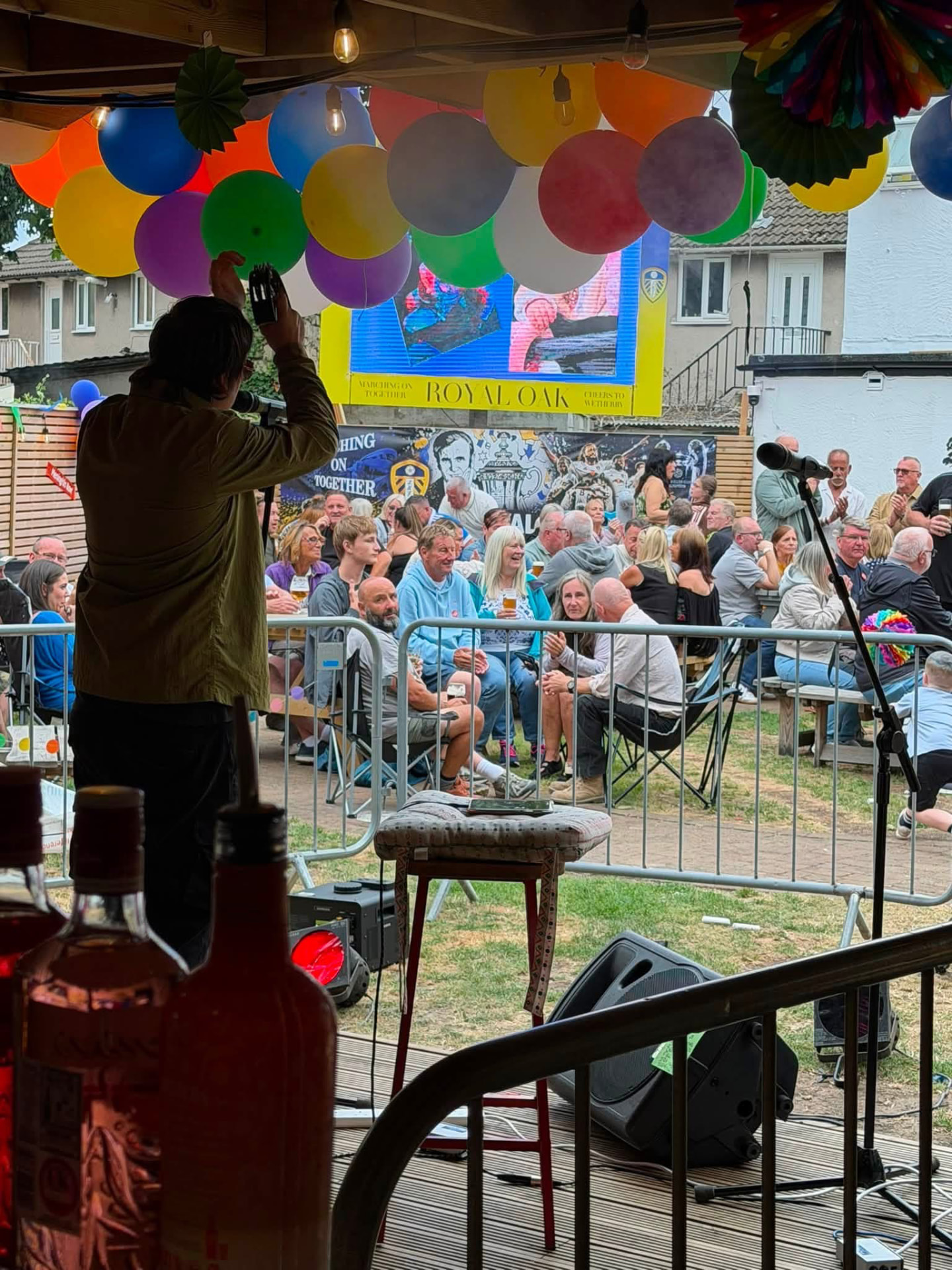 Live music performance to a packed beer garden at The Royal Oak